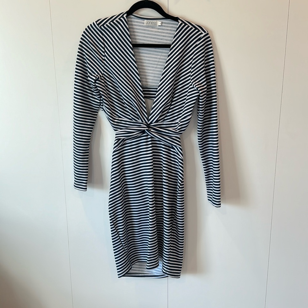 Body con, blue and white striped dress. Cut out back. Long sleeve.